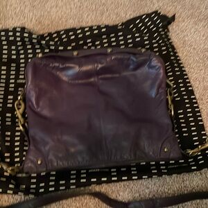 Rebecca Minkoff eggplant color leather bag. Comes with duster bag.